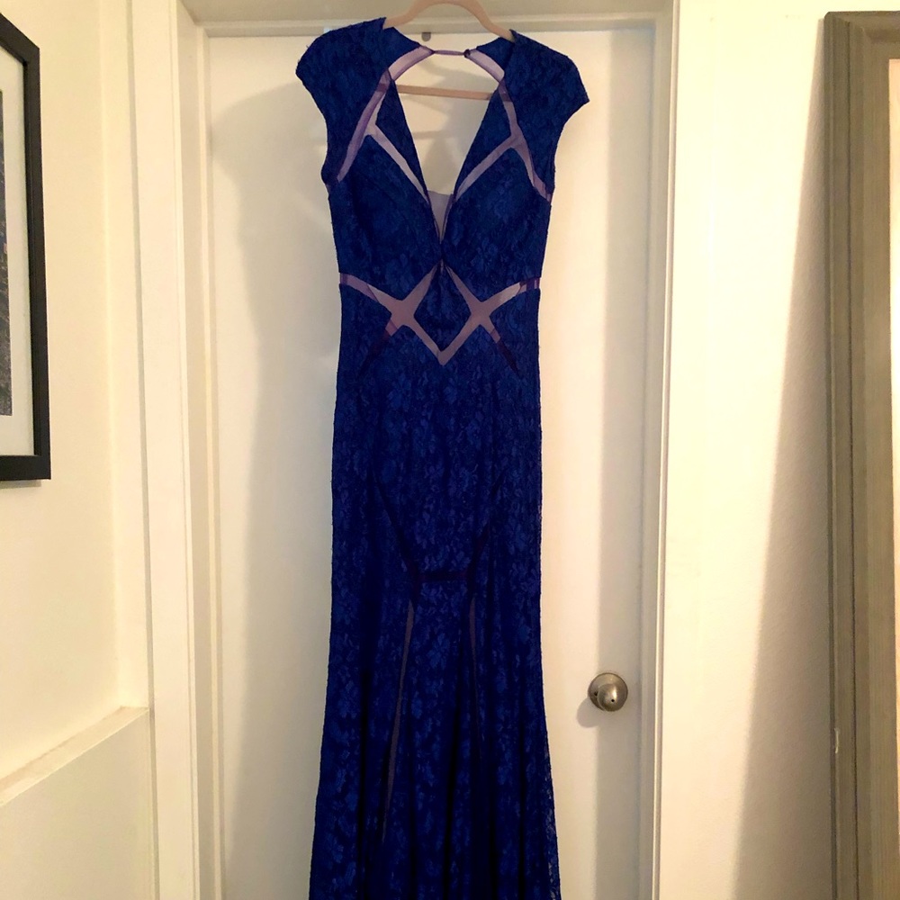 Blue ball gown. Evening dress.
